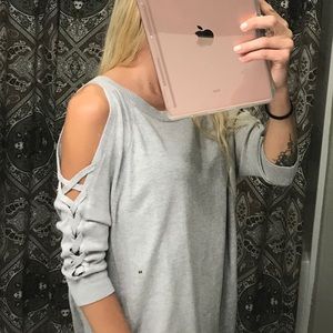 Cold shoulder high low sweater